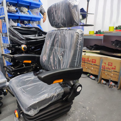 El asiento del conductor del cargador con amortiguador mecánico y rodadura de 180 grados del reposabrazos